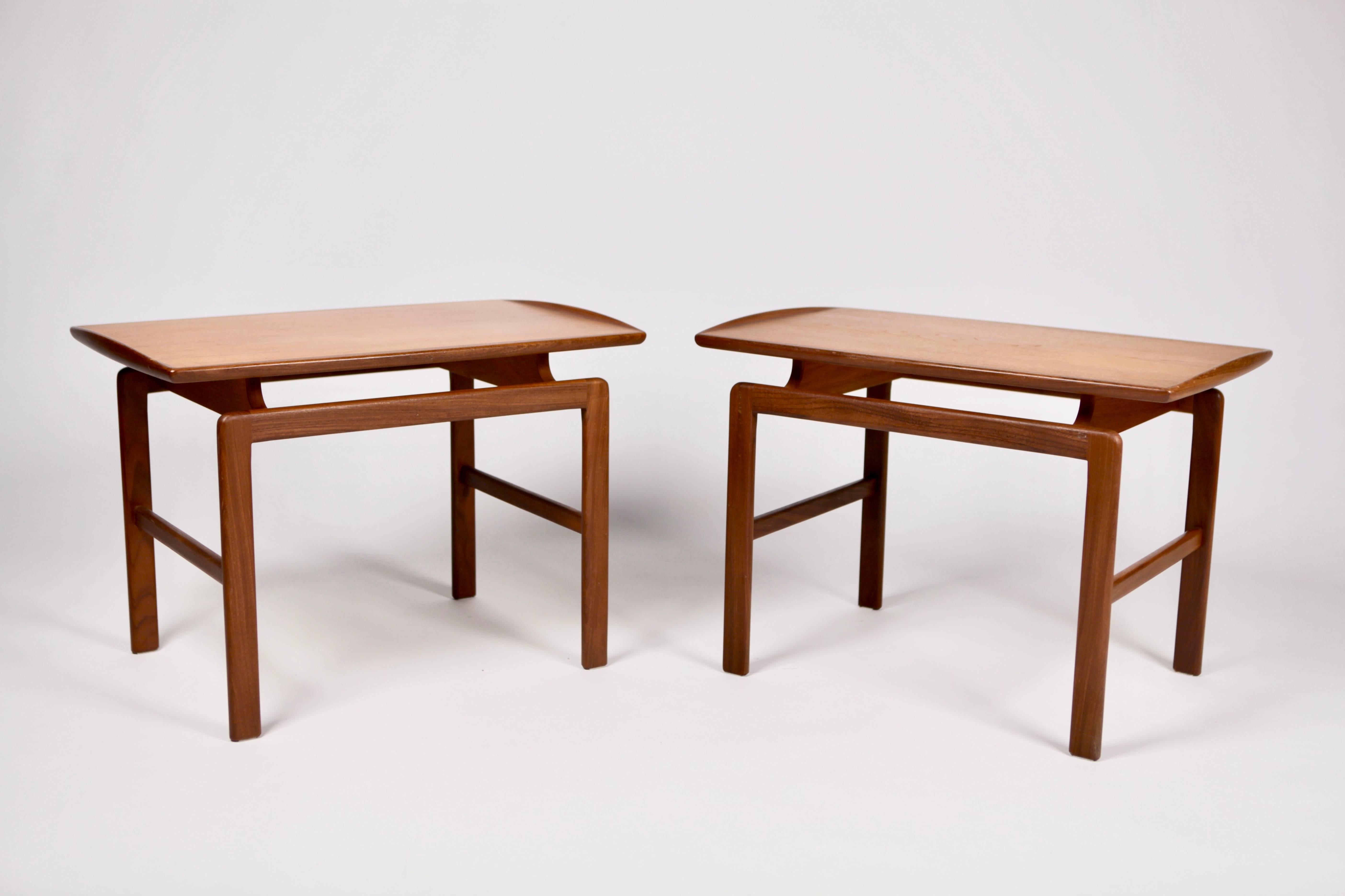 A pair of teak side tables, model 