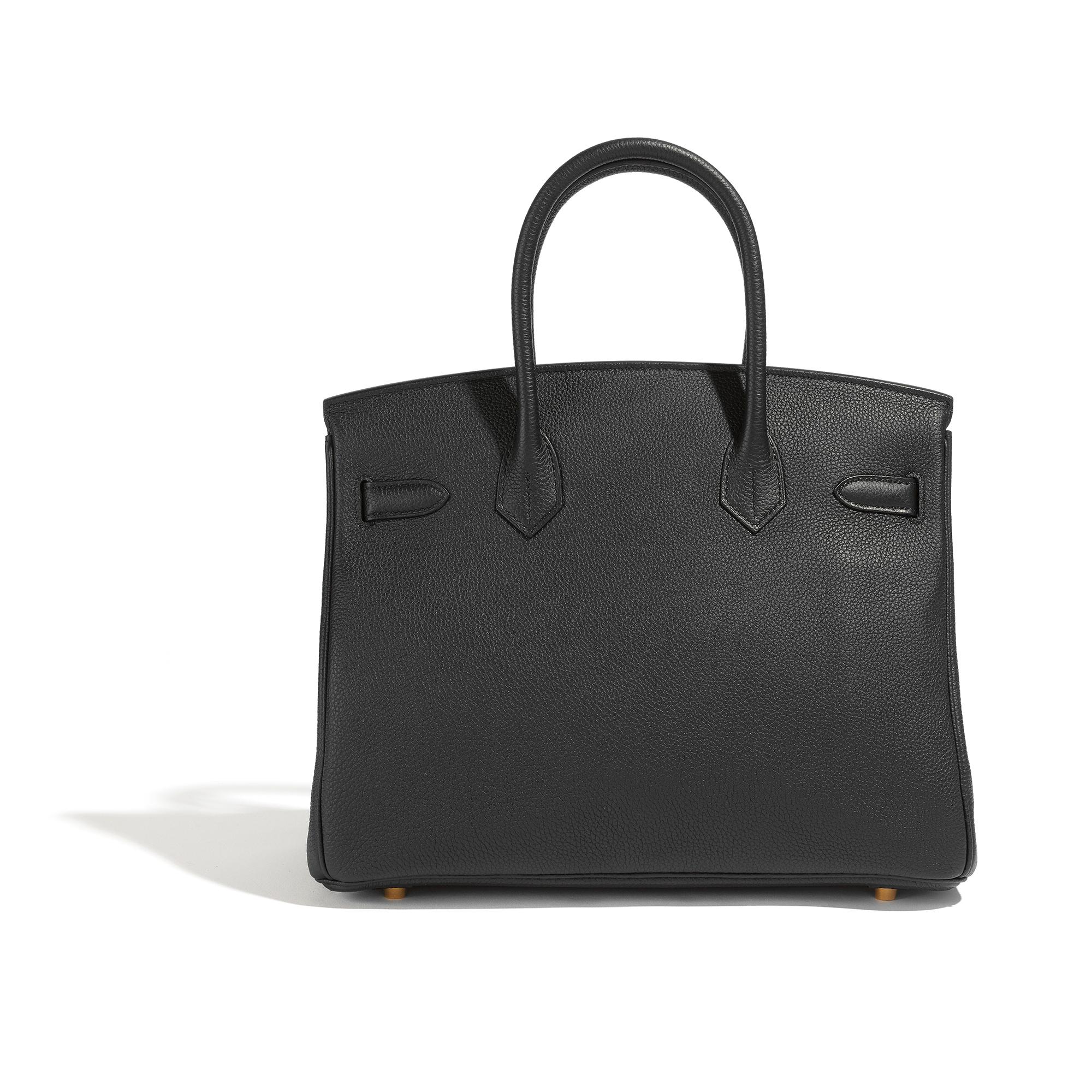 *Hermès Birkin Retourne 30
*Black
*Togo Leather
*Gold hardware
*Serial Number: YHA202BA
*Includes lock and keys
*Includes authentication certificate
*Includes receipt 
*Excellent Condition: This pre-owned item contains few signs of wear, including