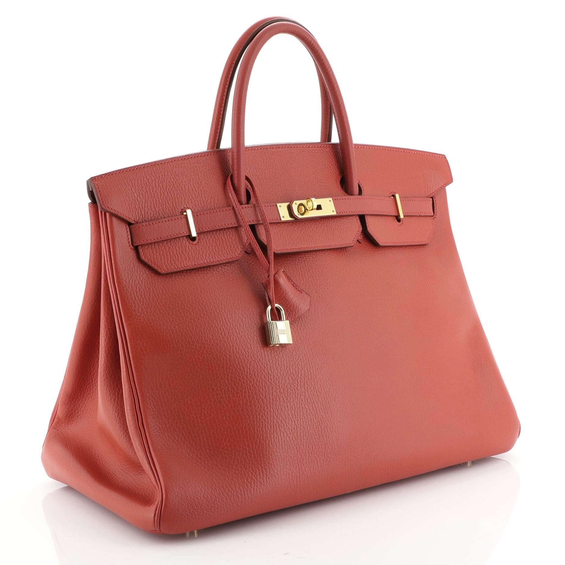 Condition: Damaged. Repainted exterior. Wear on base corner, flap edges and opening sides, moderate creasing on exterior, minor splitting on handle wax edges. Scuffs and indentations on exterior base, scratches on hardware. 
Accessories: Keys, Lock,