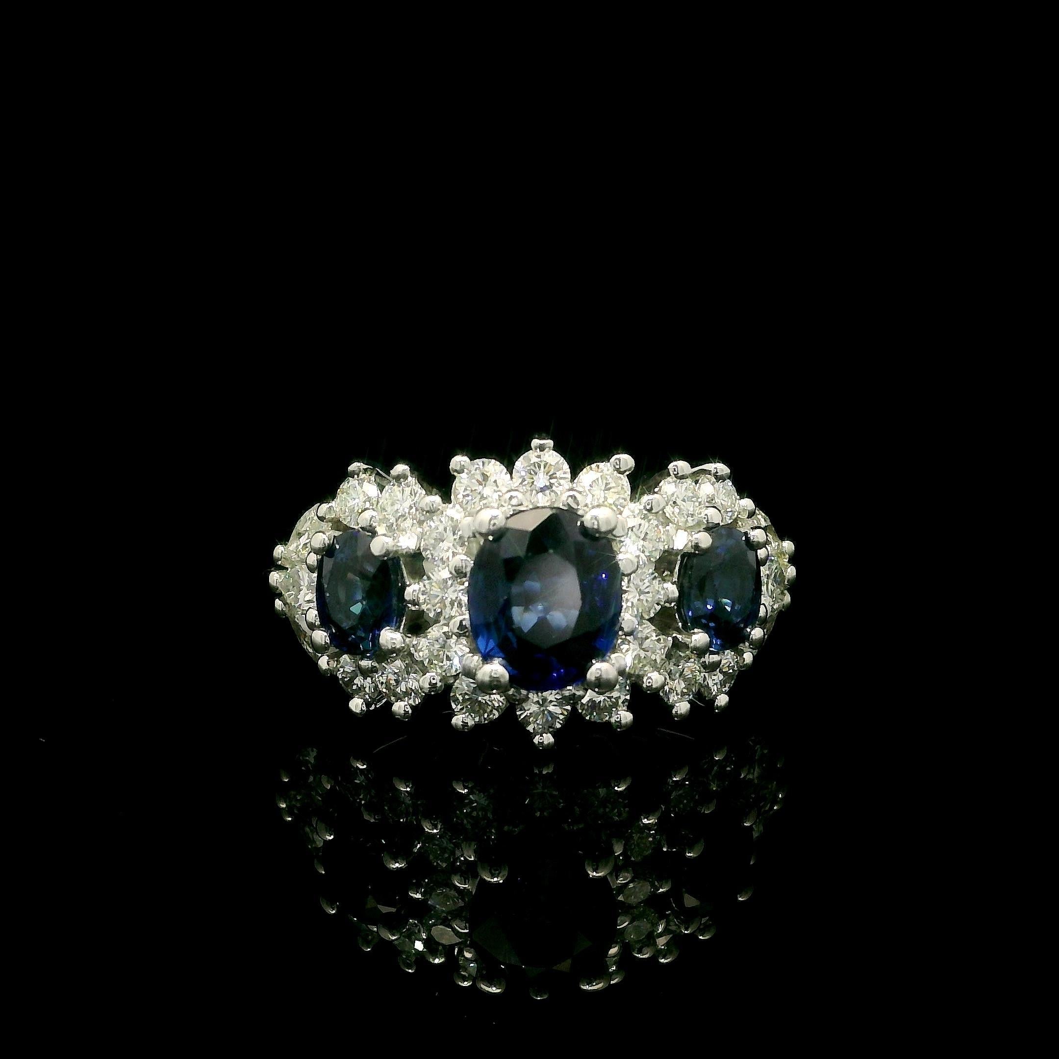 --Stone(s):--
(3) Natural Genuine Sapphires - Oval Cut - Prong Set - Royal Blue Color - 2.0ct (approx.)
Natural Genuine Diamonds - 20 Round Brilliant, 4 Marquise & 2 Pear Cut - Prong Set - G/H Color - VS1/VS2 Clarity - 0.35ctw (approx.)
Total Carat
