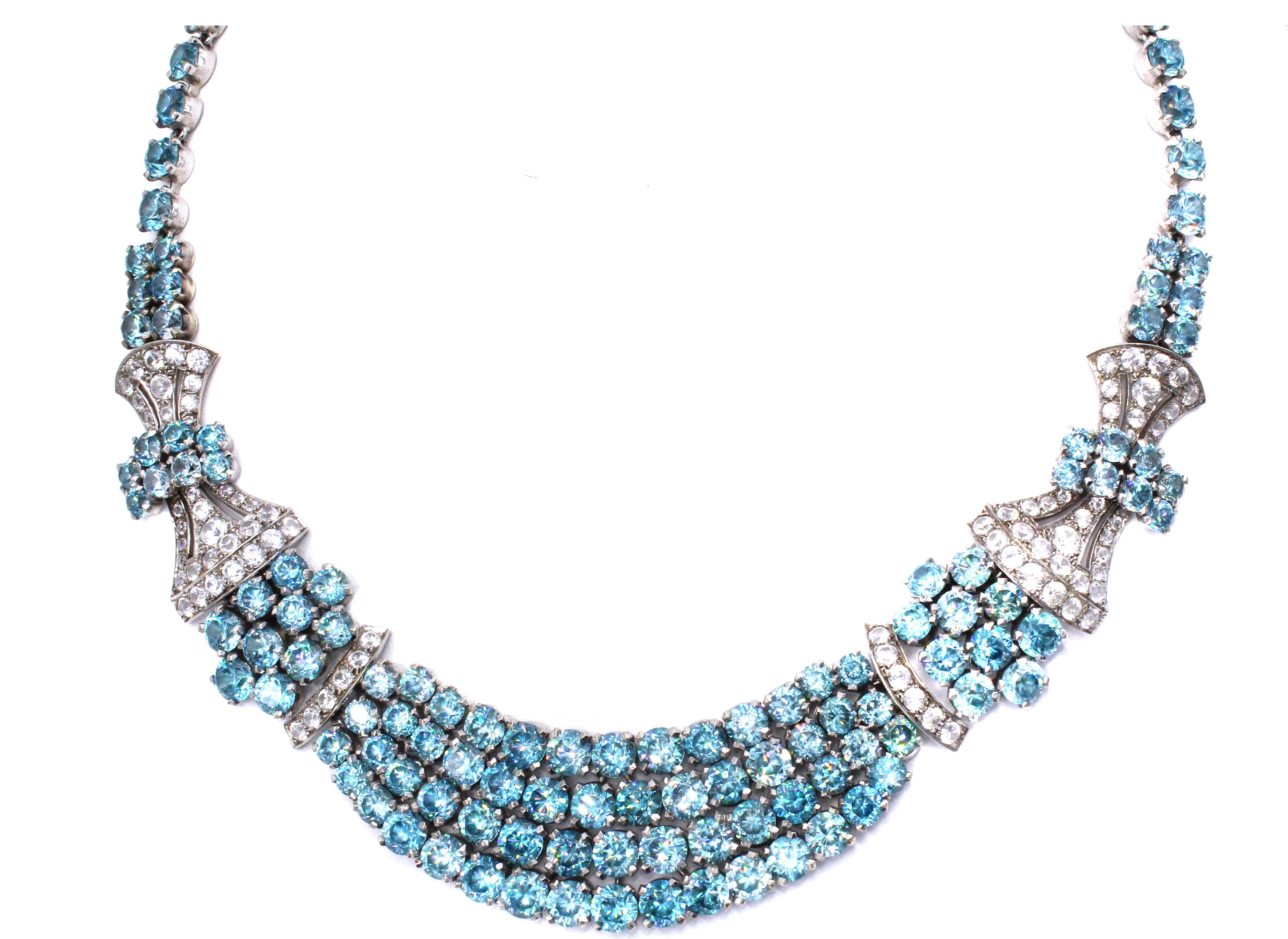 Unique Birks Art Deco from ca 1920 blue and white zircon gold necklace set with 140 blue and 88 white zircons. Birks was known as the Tiffany of Canada. Created in 1879 in Montreal by Henry Birks, a contemporary of Louis Comfort Tiffany, he took a