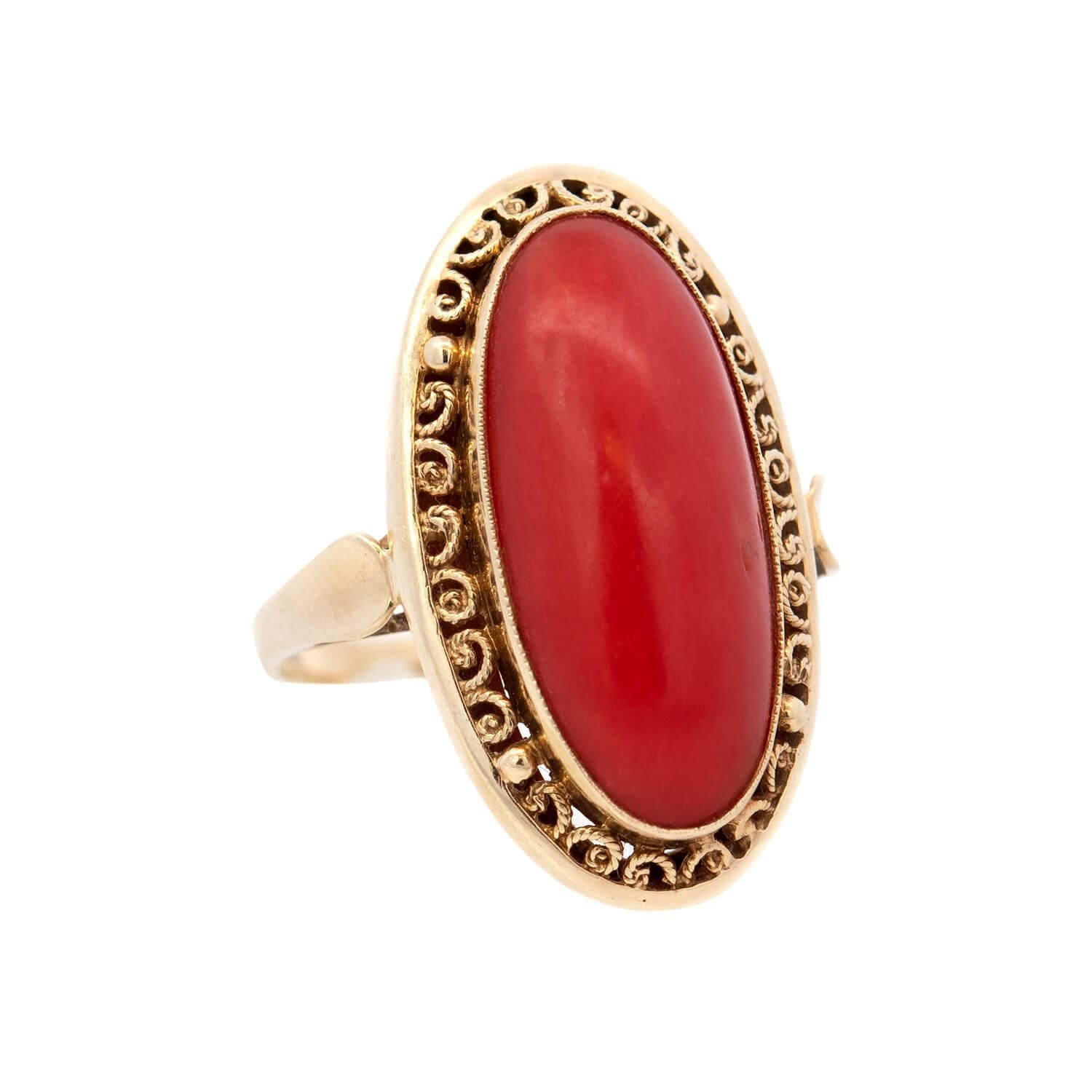 This gorgeous coral ring from the late Victorian era (ca1890) era is a signed piece by Maison Birks! Crafted in 14k yellow gold, the ring features a beautiful coral stone that is bezel set at the center of a decorative ellipse-shaped mounting. The