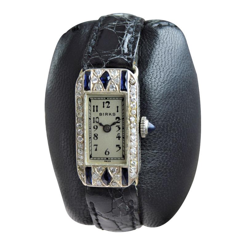 FACTORY / HOUSE: Birks of Canada
STYLE / REFERENCE: Art Deco Dress Watch
METAL / MATERIAL: Platinum
CIRCA / YEAR: 1930's
DIMENSIONS / SIZE: 27mm x 15mm
MOVEMENT / CALIBER: Manual Winding / 17 Jewels 
DIAL / HANDS: Silvered with Blued Steel