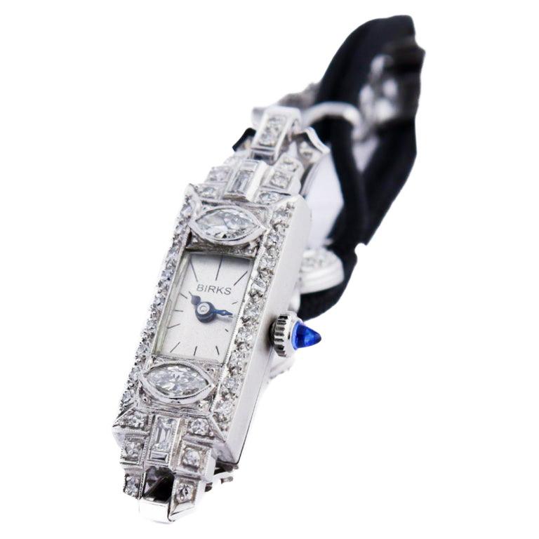 Birks Platinum Art Deco Watch from the 1930s Handmade Diamond Cord Bracelet For Sale 1