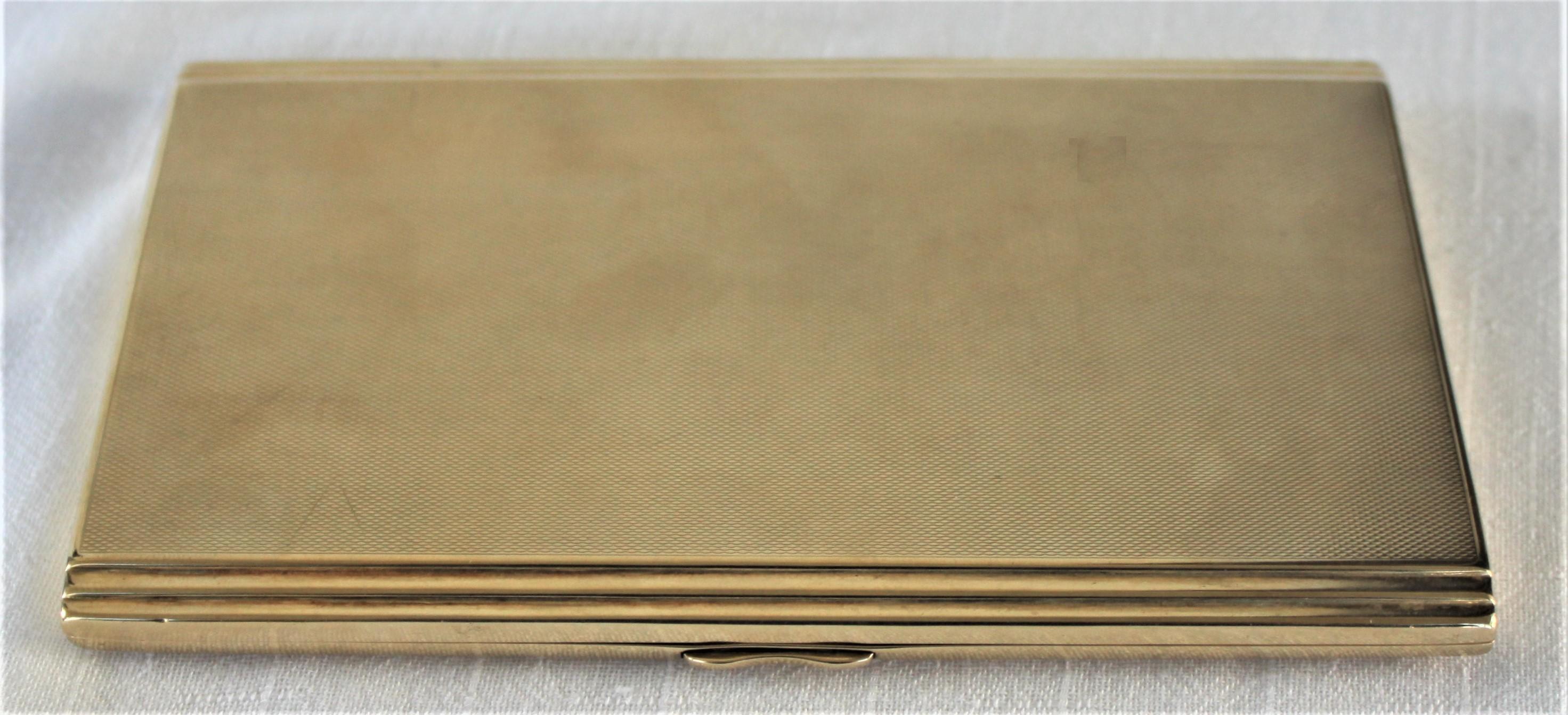 This large and substantial solid 9-karat yellow gold cigarette case was made in Birmingham England and dates to the late 1930s. The case was sold by the renowned Birks Department Store chain and was presumed to have been an item from their 'Estate