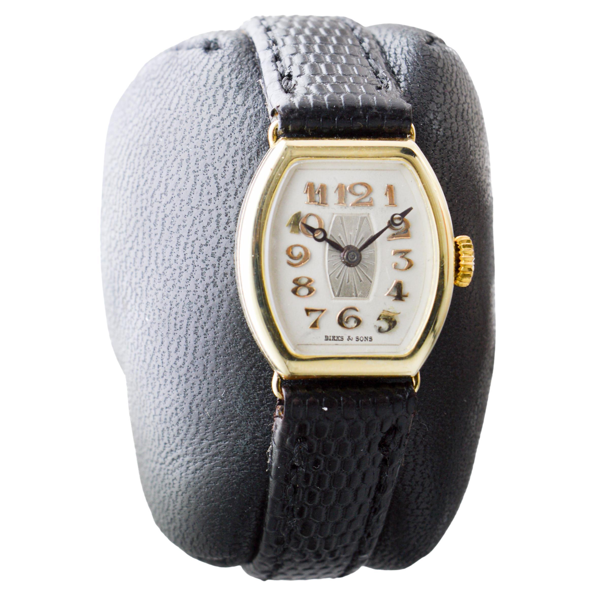 FACTORY / HOUSE: Birks & Sons
STYLE / REFERENCE: Art Deco / Tonneau Shape
METAL / MATERIAL: 14Kt Solid Gold
CIRCA / YEAR: 1930's
DIMENSIONS / SIZE: Length 25mm Lug Tip to Lug Tip X Diameter 20mm
MOVEMENT / CALIBER: Manual Winding / 17 Jewels  
DIAL