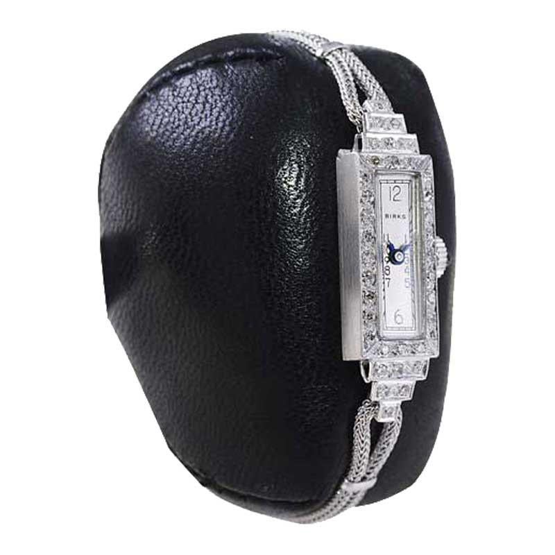 FACTORY / HOUSE:  Henry Birks & Sons 
STYLE / REFERENCE: Art Deco / Dress Style 
METAL / MATERIAL: Platinum with Stainless Cord Bracelet
CIRCA / YEAR: 1940's 
DIMENSIONS / SIZE: Length 35mm X Width 10mm
MOVEMENT / CALIBER:  Manual Winding / 17