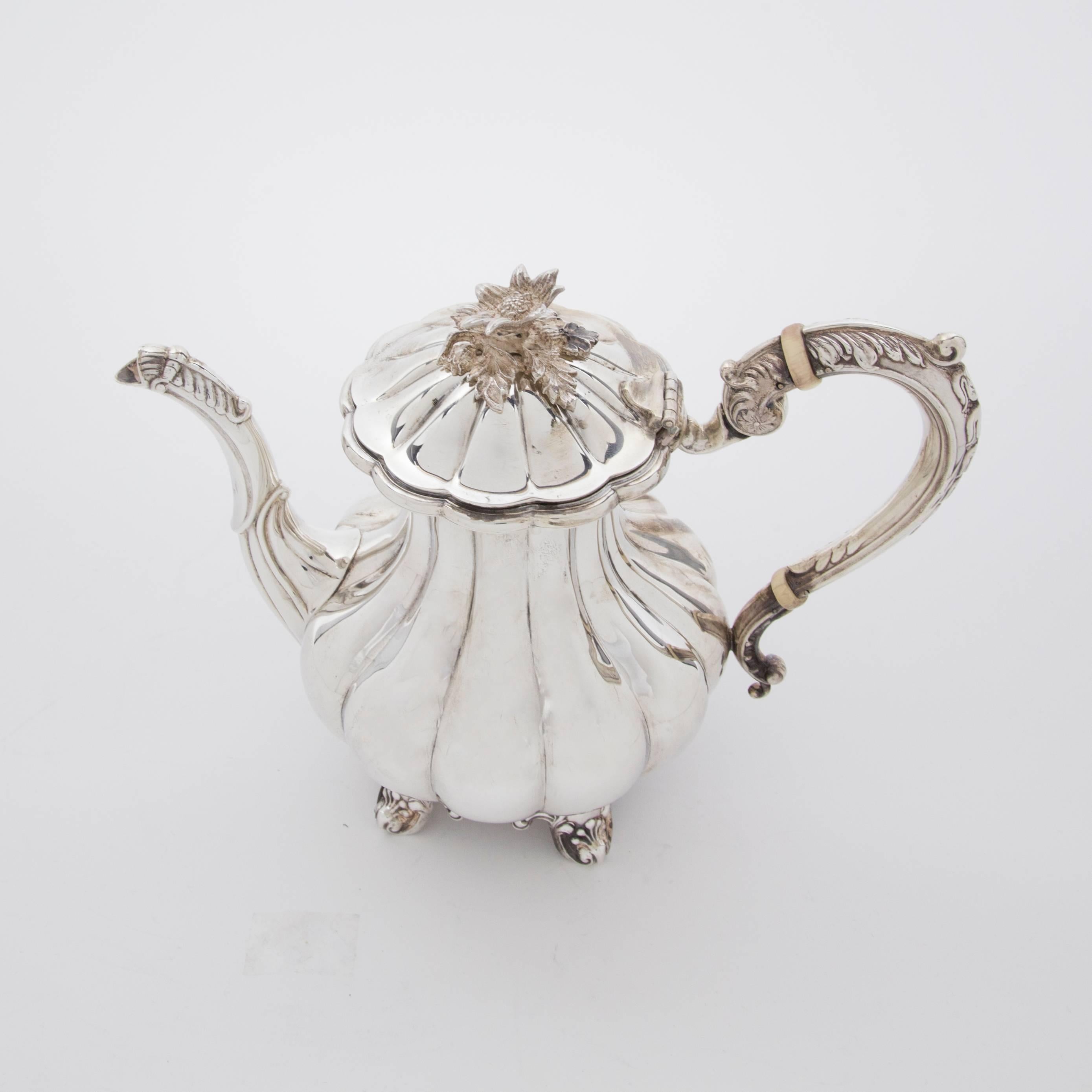 Four piece Birks sterling silver tea and coffee set in the ‘Melon’ pattern; comprising: One coffee pot approximate 9