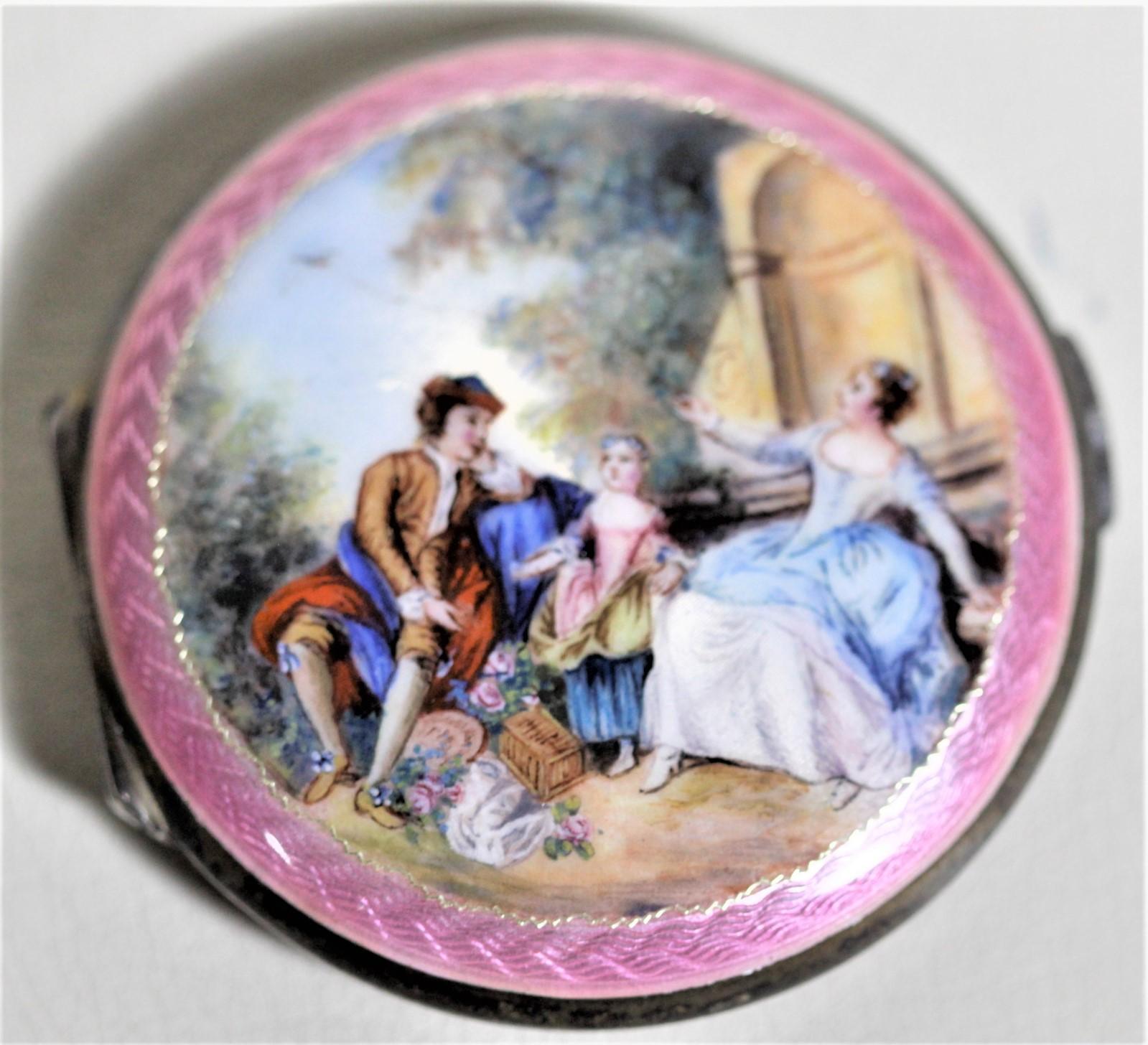This sterling silver ladies compact was made for the Birks retailer in presumably France in circa 1950. This compact features an enamel portrait done in the French Renaissance Revival style which is bordered by a vibrant pink guilloche enamel