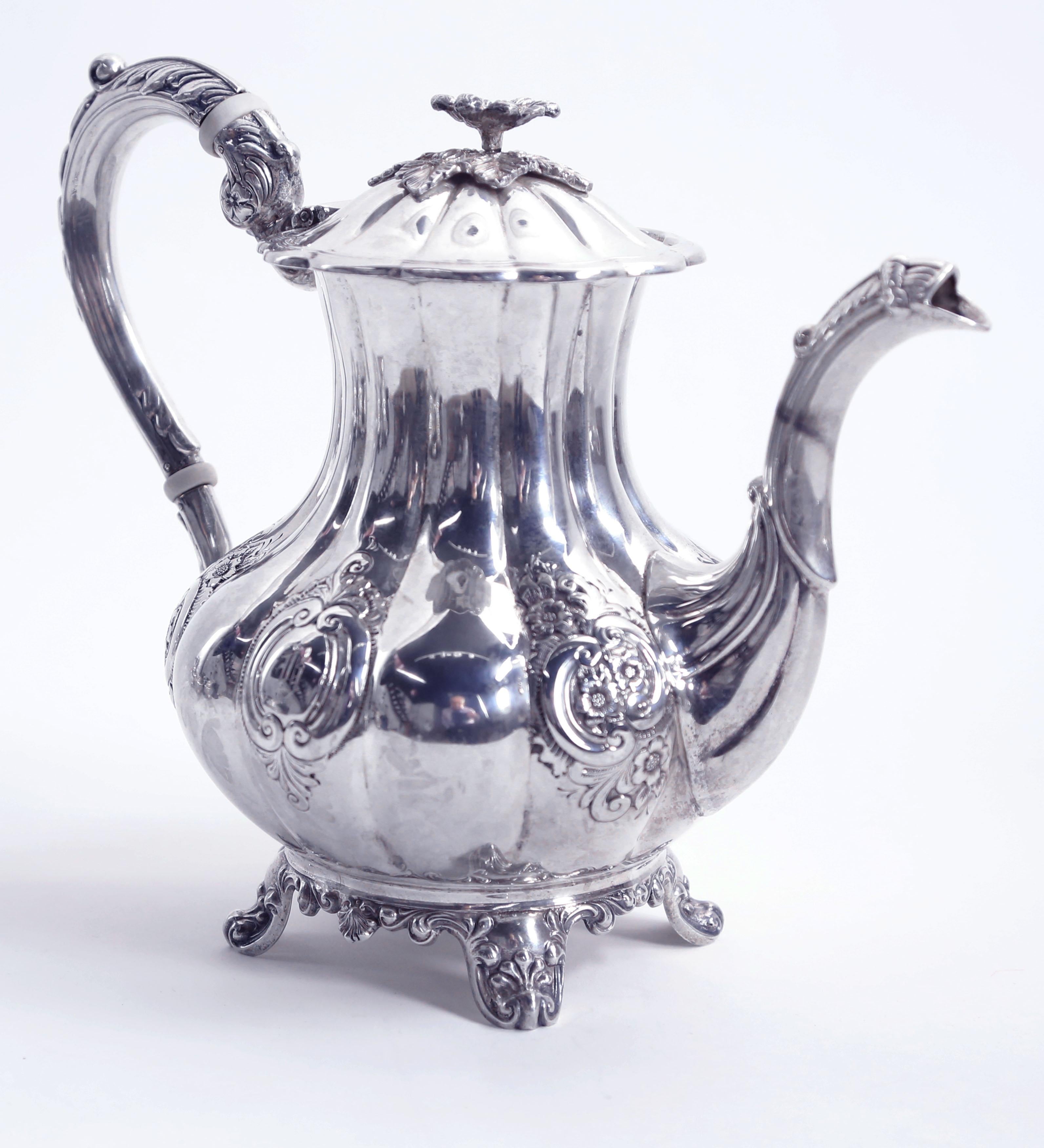 Beautiful and elegant five-piece Birks sterling silver coffee tea set; handcrafted in Repoussé Floral pattern, comprising of a coffee pot, a tea pot, a hot water pot, sugar bowl and creamer. Approximate dimensions: Coffee pot is 9 inches tall x 11