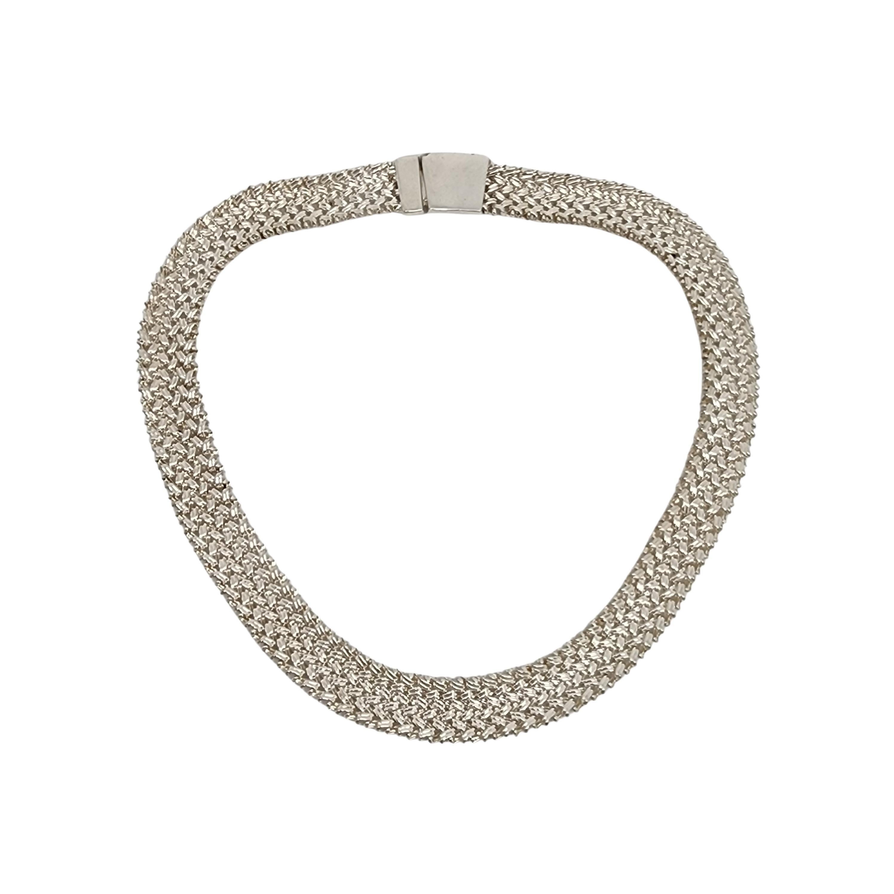 Birks sterling silver wide flat woven chain necklace

This chain substantial necklace features a wide woven design with push button clasp closure.

Weighs approx 70.9g, 45.6dwt

Measures approx 17 1/2