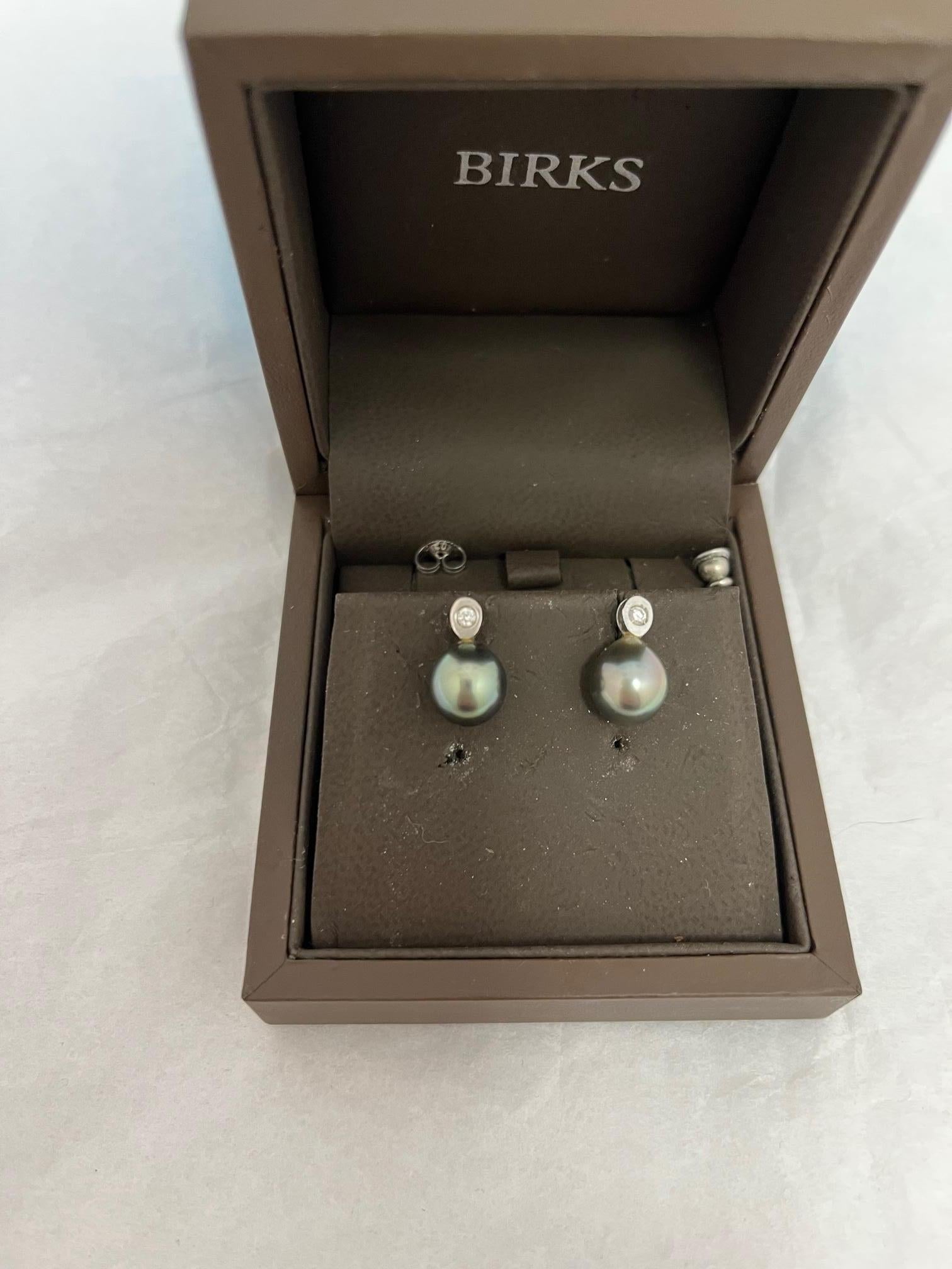 Birks is a Canadian high end jewelry store first opened in Montreal in 1879, by Henry Birks who was a master silversmith from  Sheffield, England.
This is a beautifully crafted pair of pierced earrings in their original boxes. The Tahitian cultured