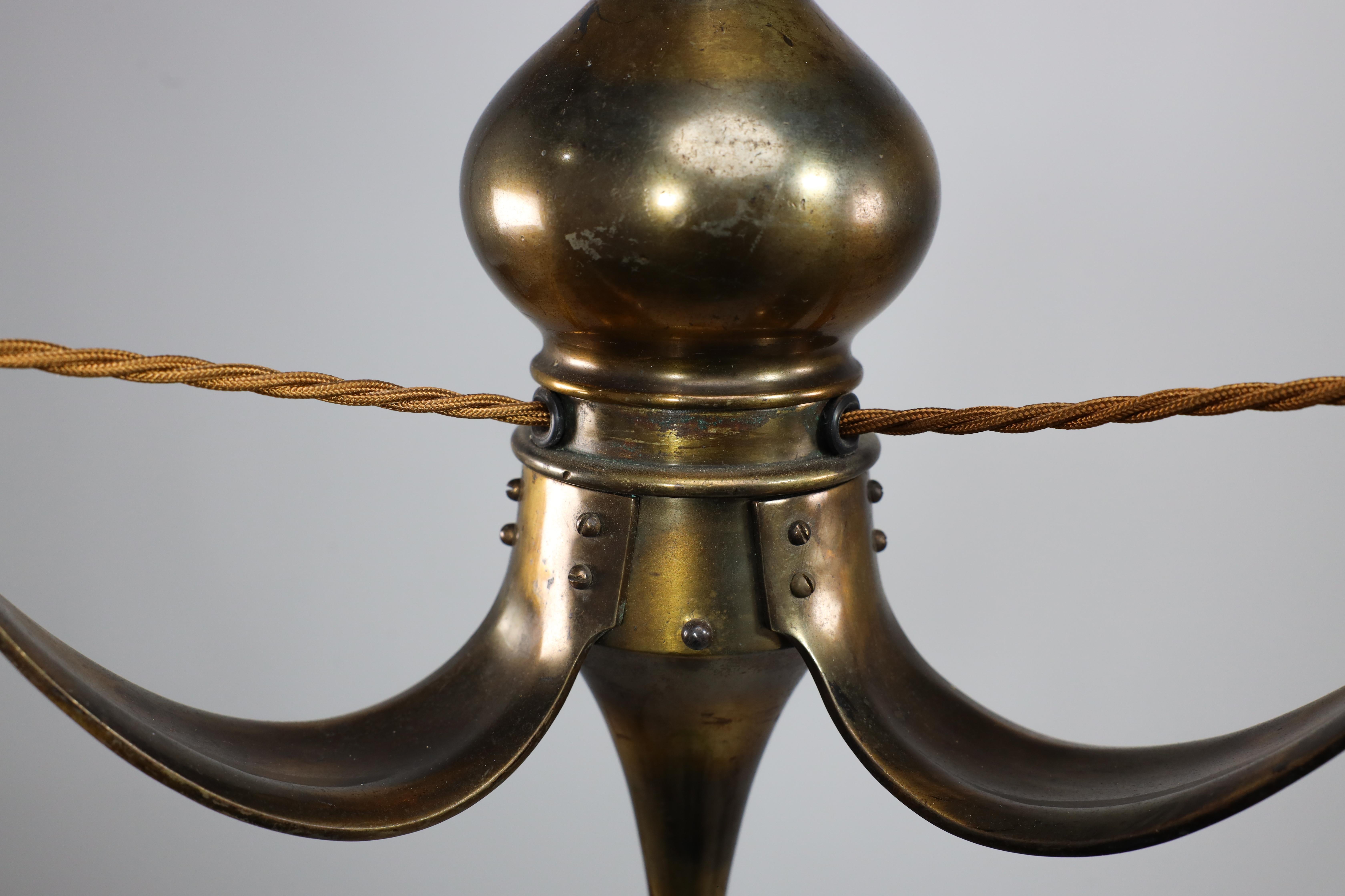 Brass Birmingham Guild of Handicraft. An Arts and Crafts three arm brass ceiling light For Sale