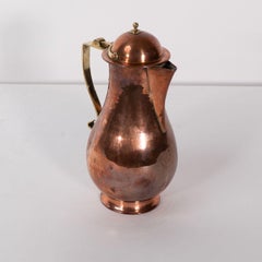 Birmingham Guild of Handicraft. An Arts & Crafts copper and brass chocolate jug