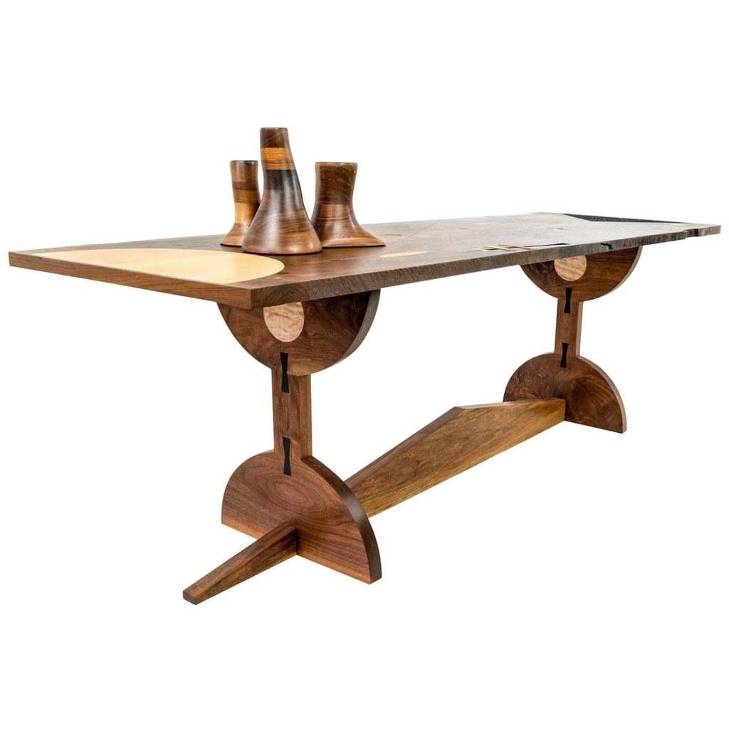 This handmade poet's desk is made of wood by Birnam Wood Studio in New York. This contemporary desk design is heavily influence by traditional mid-century modern geometric shapes, but with a new and modern twist. The design plays with different