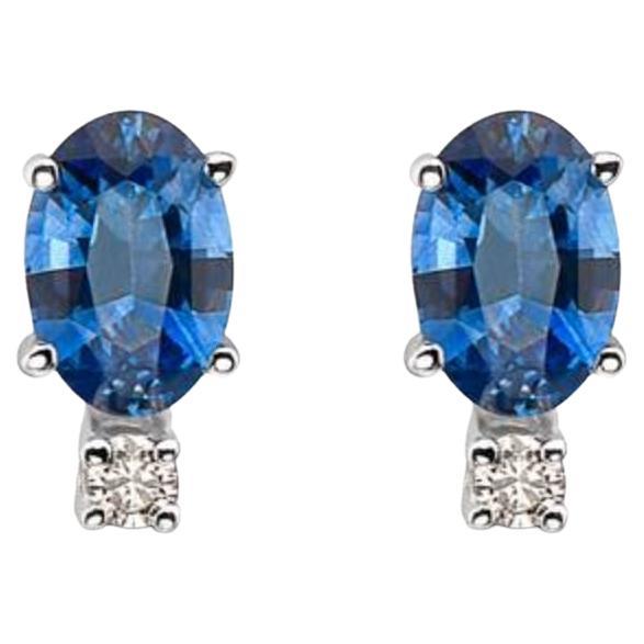 Birthstone Earrings Featuring Cornflower Sapphire Nude Diamonds Set in 14K For Sale