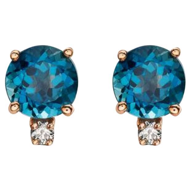 Birthstone-Ohrringe mit tiefseeblauem Topas und nudefarbenen Diamanten im Angebot