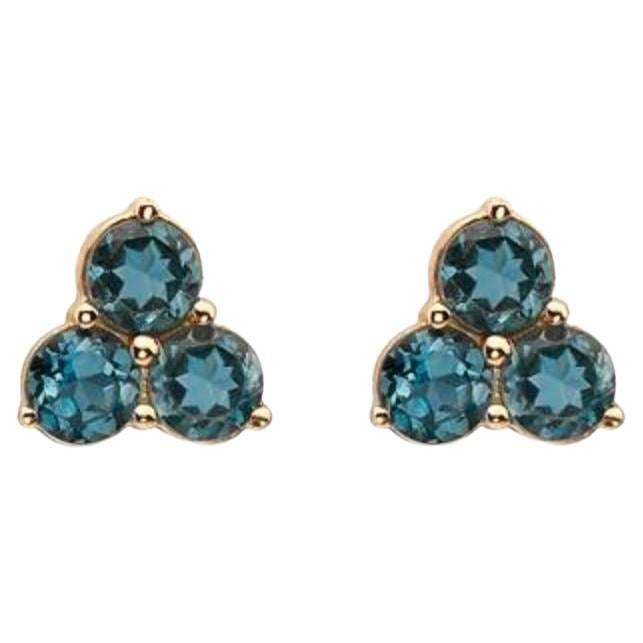 Boucles d'oreilles en or jaune 14 carats avec topaze bleue des mers profondes et pierre de naissance