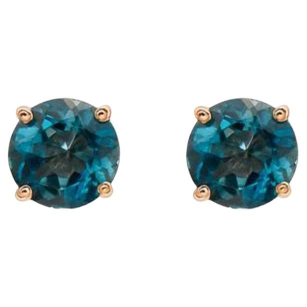 Birthstone Earrings Featuring Deep Sea Blue Topaz Set in 14K Strawberry Gold For Sale