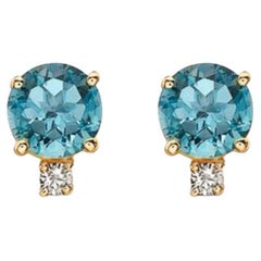 Boucles d'oreilles en pierre de naissance avec topaze bleu océan et diamants nus