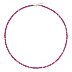 Collier à station en or avec rubis, pierre de naissance de juillet