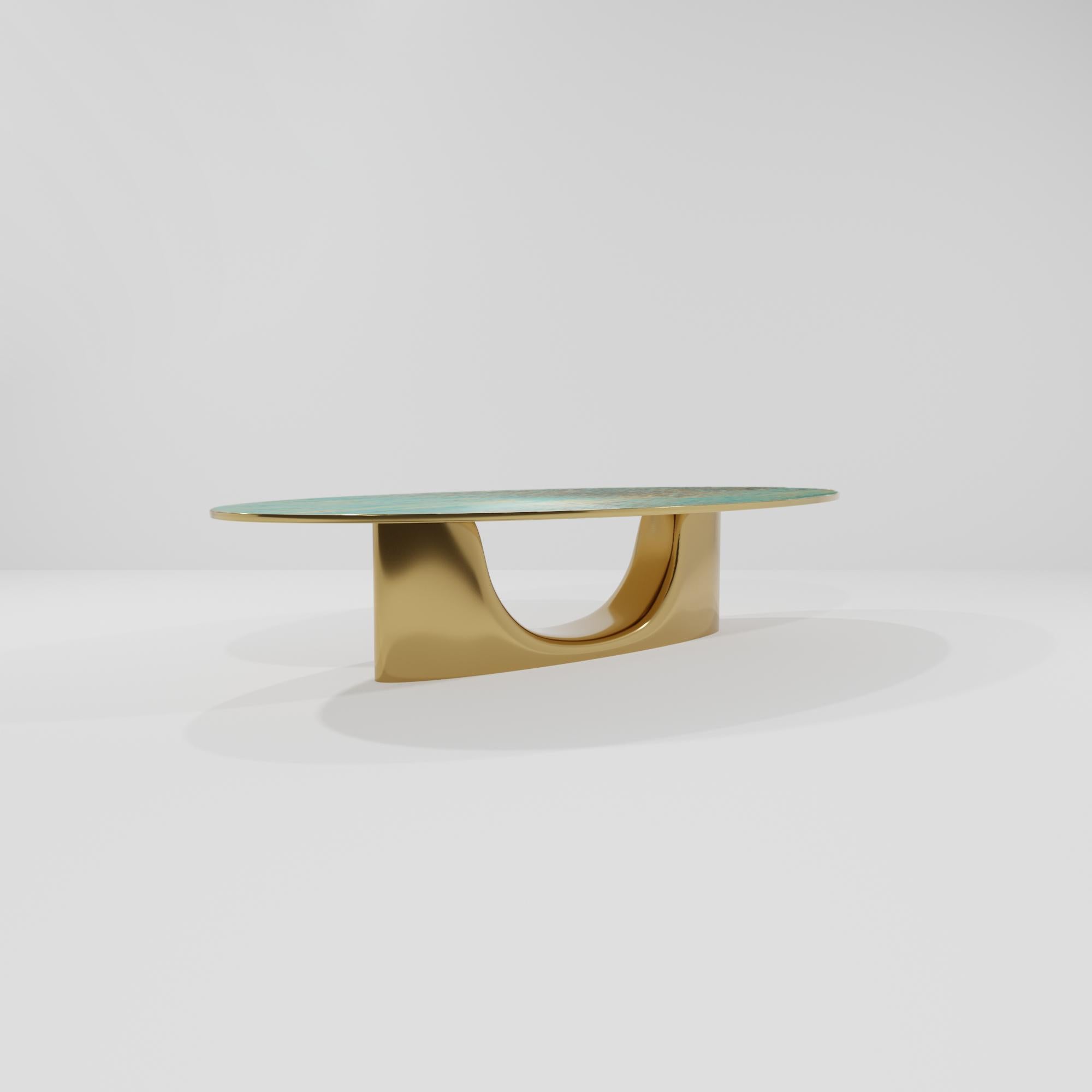 The BIS dining table is a Studio SORS. 2021 Collection piece that is made entirely by the hand of a single artisan. Hand carved solid wood is bronze cast and polished, the tabletop surface features a hand developed blue green copper finish that