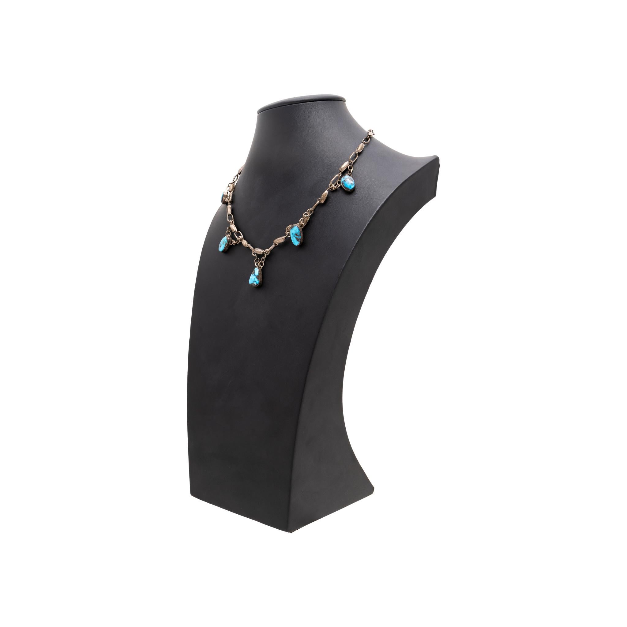 Old pawn turquoise and sterling silver necklace. Patinated chain and bead sterling necklace with five natural and untreated Bisbee turquoise stones each attached to small link chain. No maker's mark. Great for casual solo wear, or for layering with