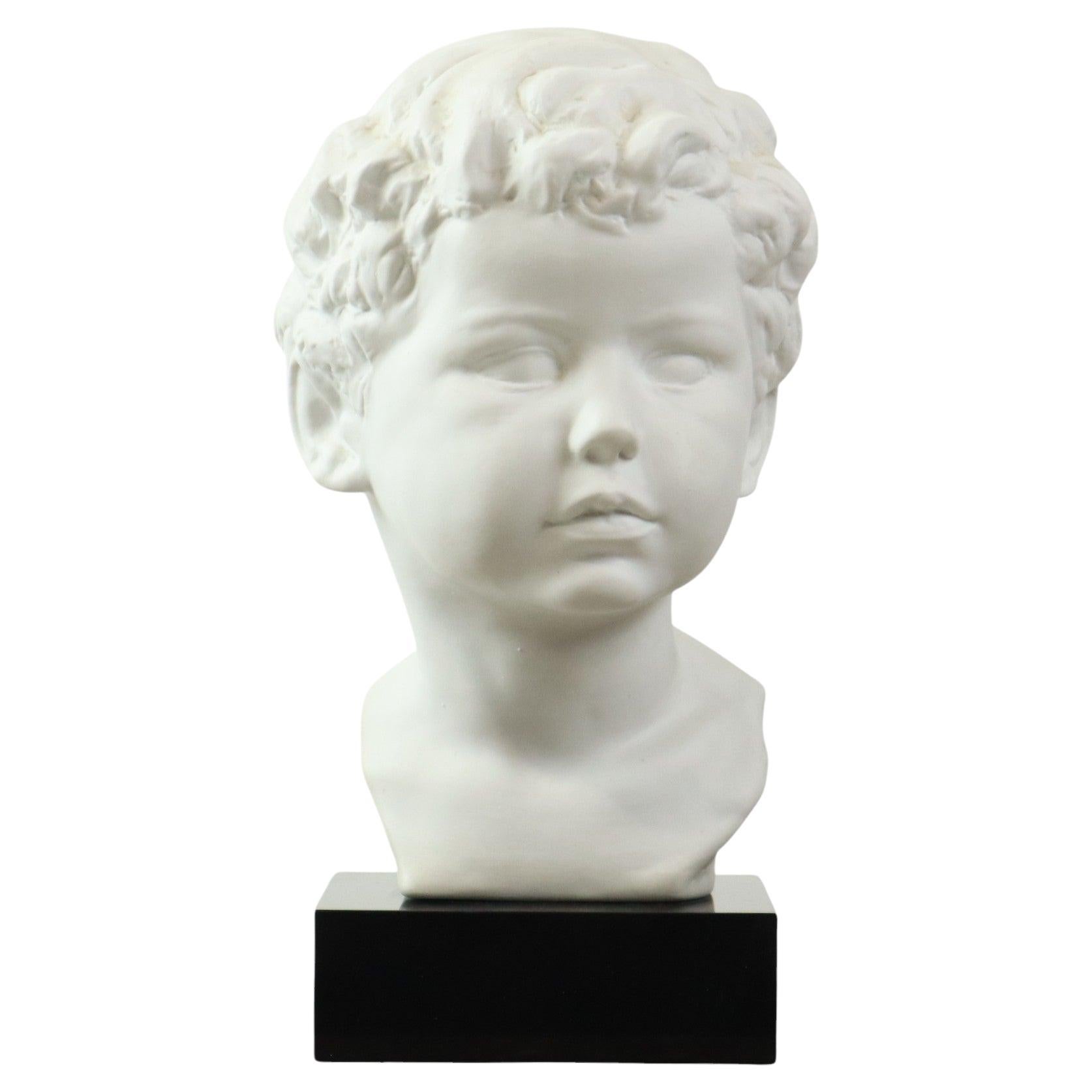 Busto in porcellana Biscuit Child
Child Base in granito nero 34cm