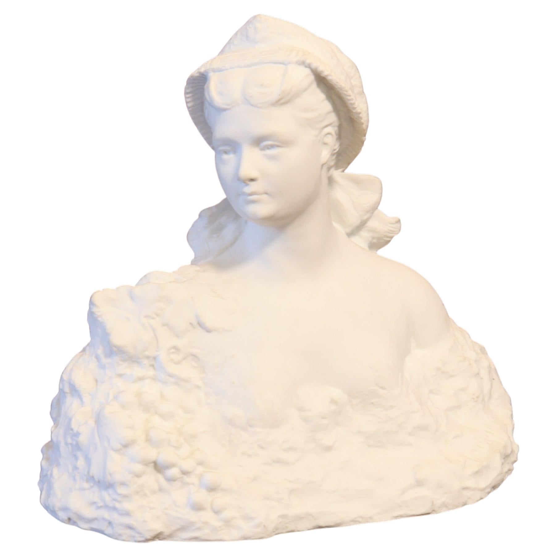 Buste tourangelle en porcelaine biscuit de Georges Delperier