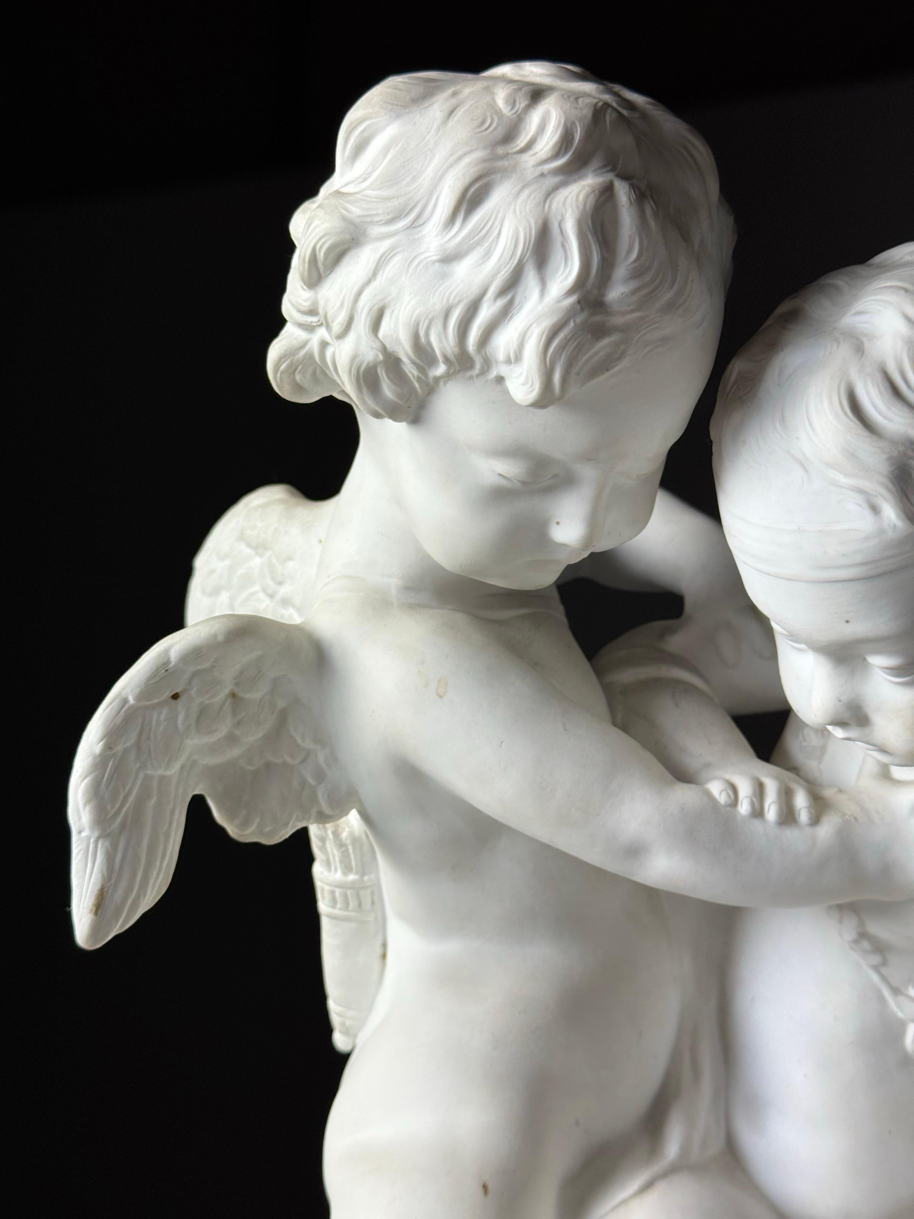 Early 20th Century Biscuit Porcelain statue of 2 Putti’s after Falconet For Sale