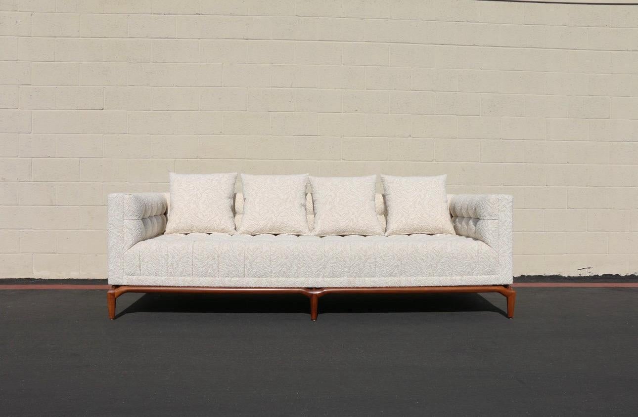 Marvelous biscuit tufted sofa designed by Maurice Bailey for Monteverdi Young, ( It has no label). from the 1960s. This sofa is in excellent condition. It has been restored, (refinished and reupholstered). The fabric it is clean and very well kept