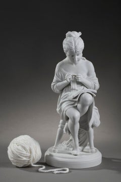 Biscuit "Young girl knitting" from the Scheibe-Alsbach