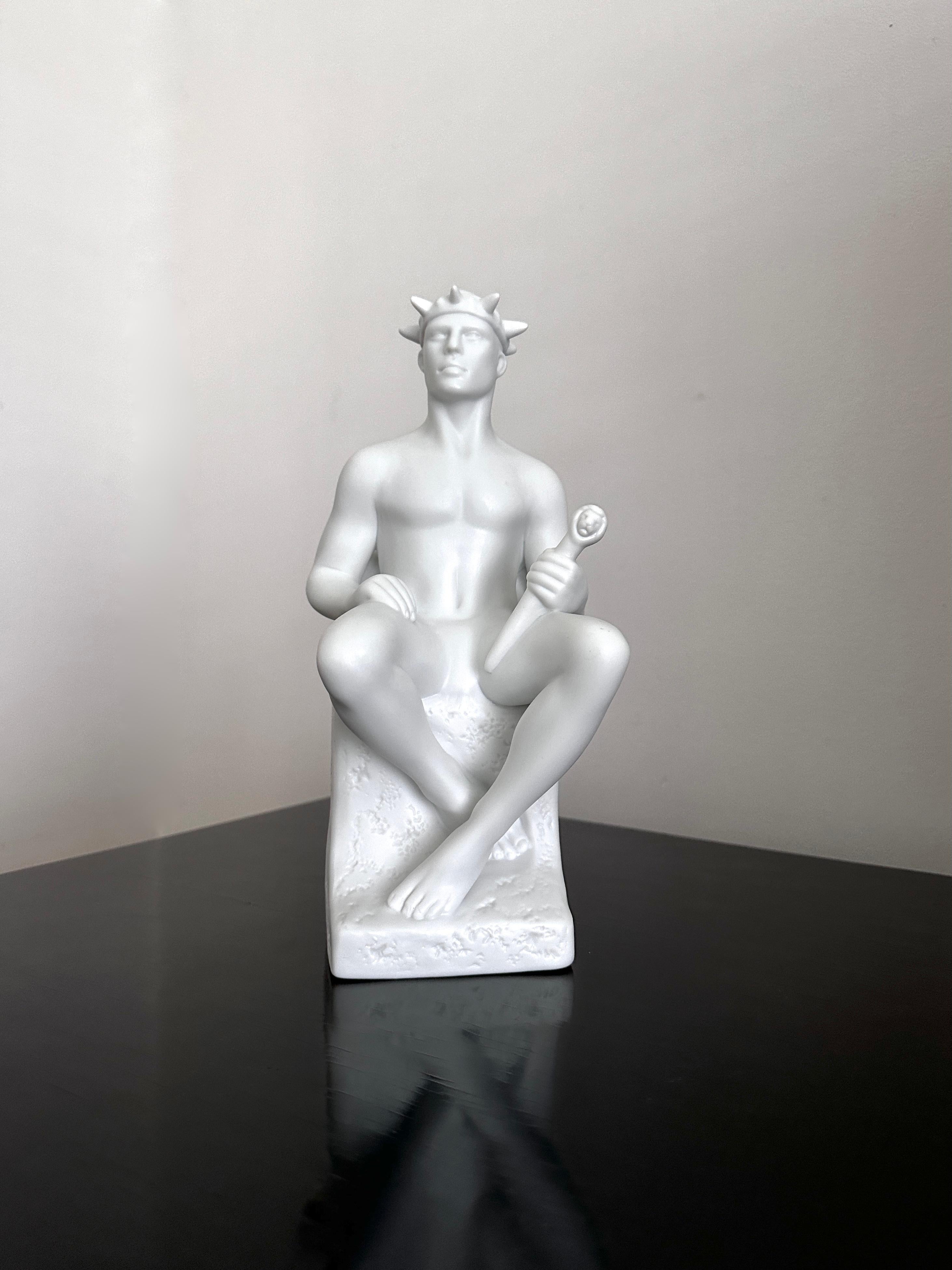 Beautiful bisque, matte white, statue of a man designed by Pia Langelund for Royal Copenhagen. The statue is one of the zodiac figures and this statue represents Leo. Designed probably sometime in the 1990's and has been discontinued.The sculpture