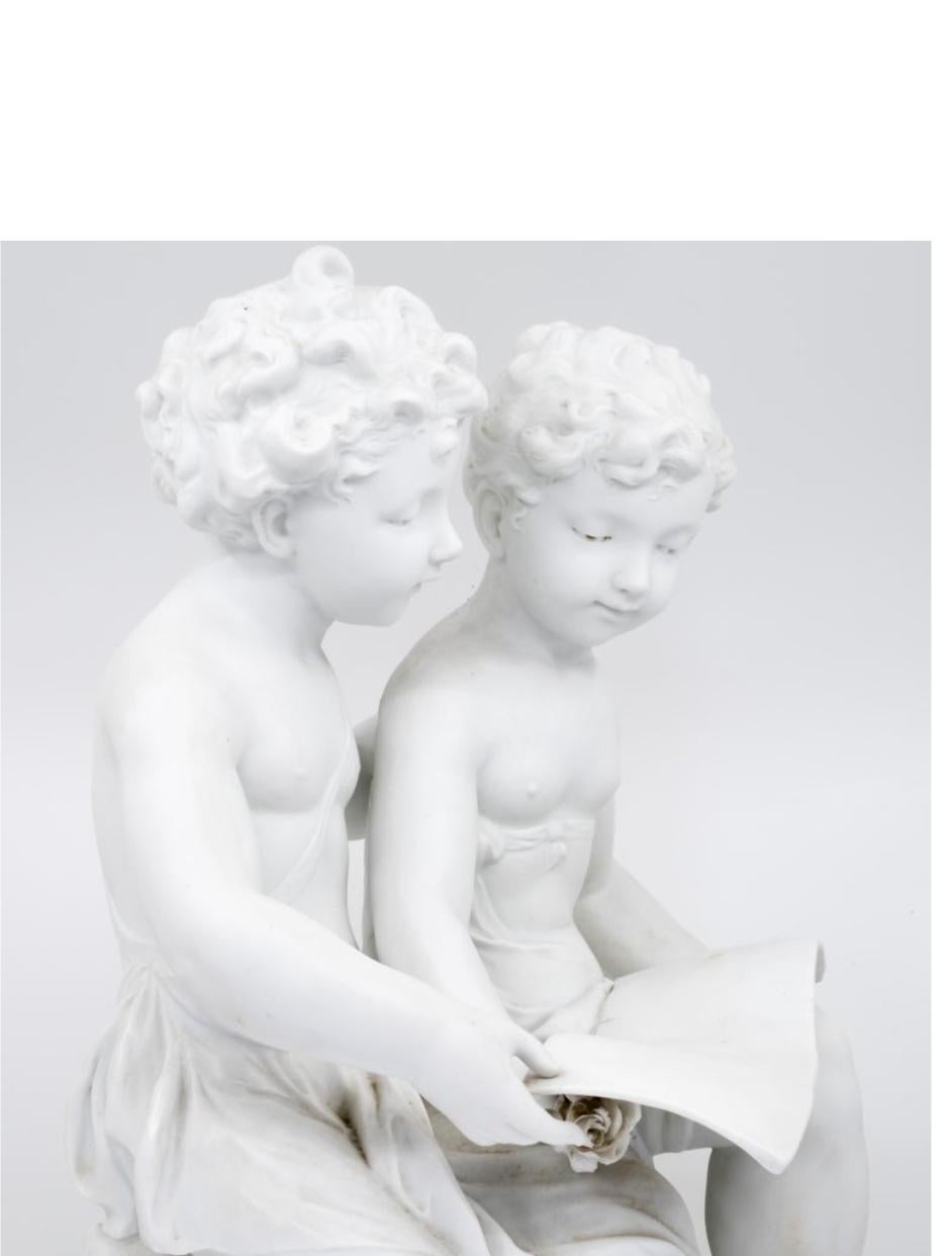 Hand-Carved Bisque Porcelain a Stature of Boy and Girl Reading a Book, French, 19th Century For Sale