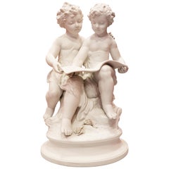 Bisque Porcelain a Stature of Boy and Girl Reading a Book, French, 19th Century