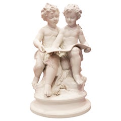 Bisque Porcelain a Stature of Boy and Girl Reading a Book, French, 19th Century