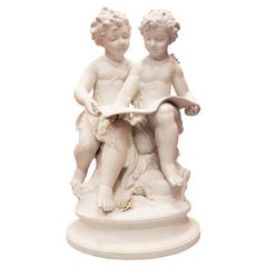 Antique Bisque Porcelain a Stature of Boy and Girl Reading a Book, French, 19th Century