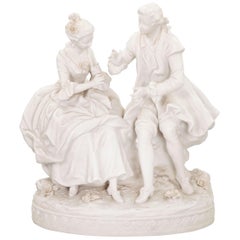 Couple en conversation en porcelaine biscuit, français, 19ème siècle