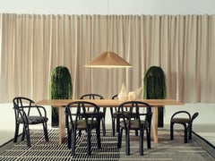 Fauteuil de salle à manger 'Bistra' en rotin peint à l'ébène par AMDL Circle pour Gubi