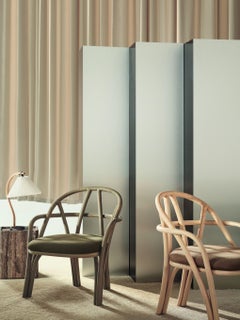 'Bistra' Lounge Chair in Olive Stained Rattan by AMDL Circle for GUBI