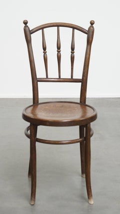 Bistro chair with carved seat