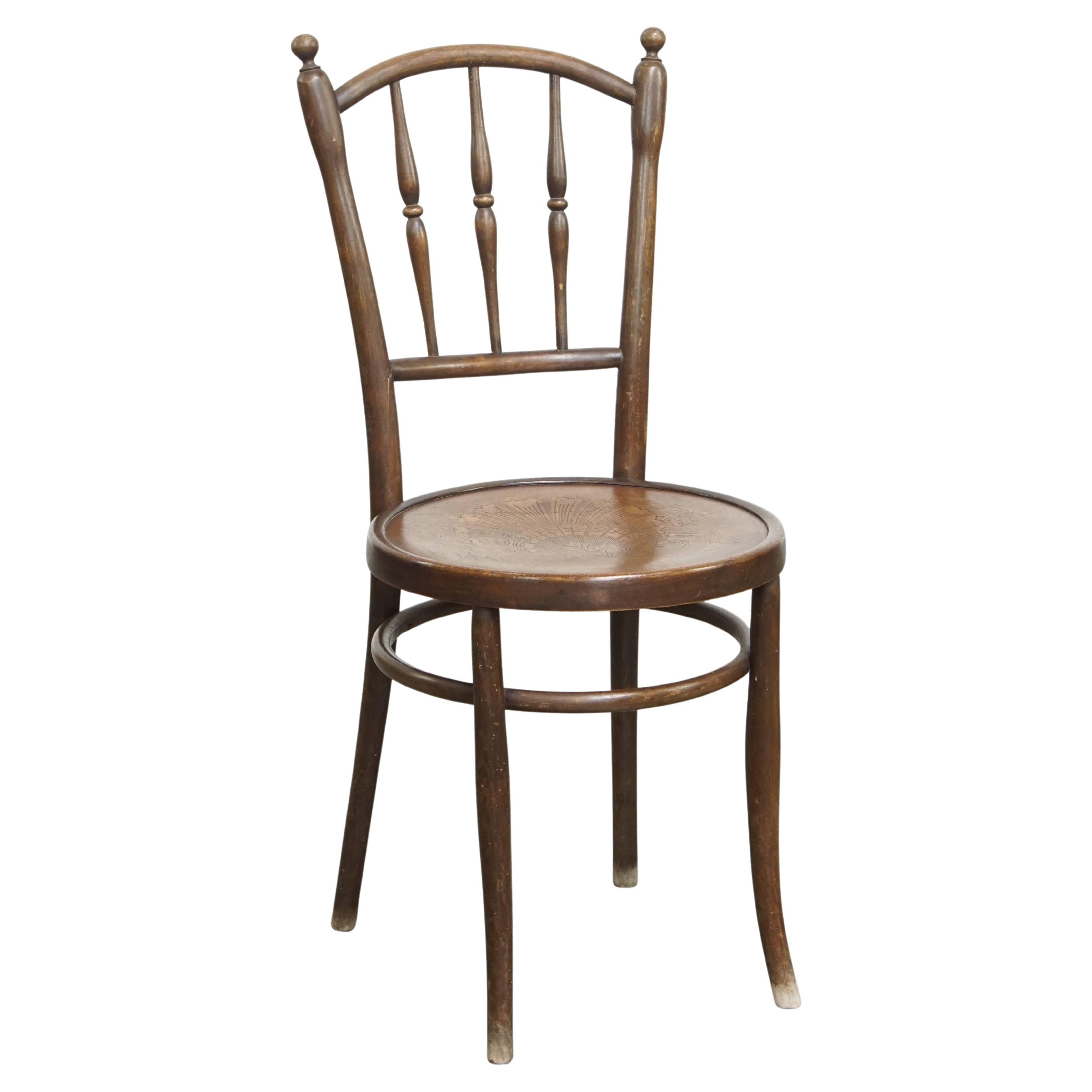 Sedia da bistrot con seduta intagliata