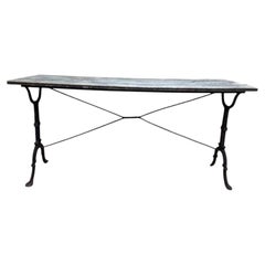 Bistro table with cast iron base and solid oak top