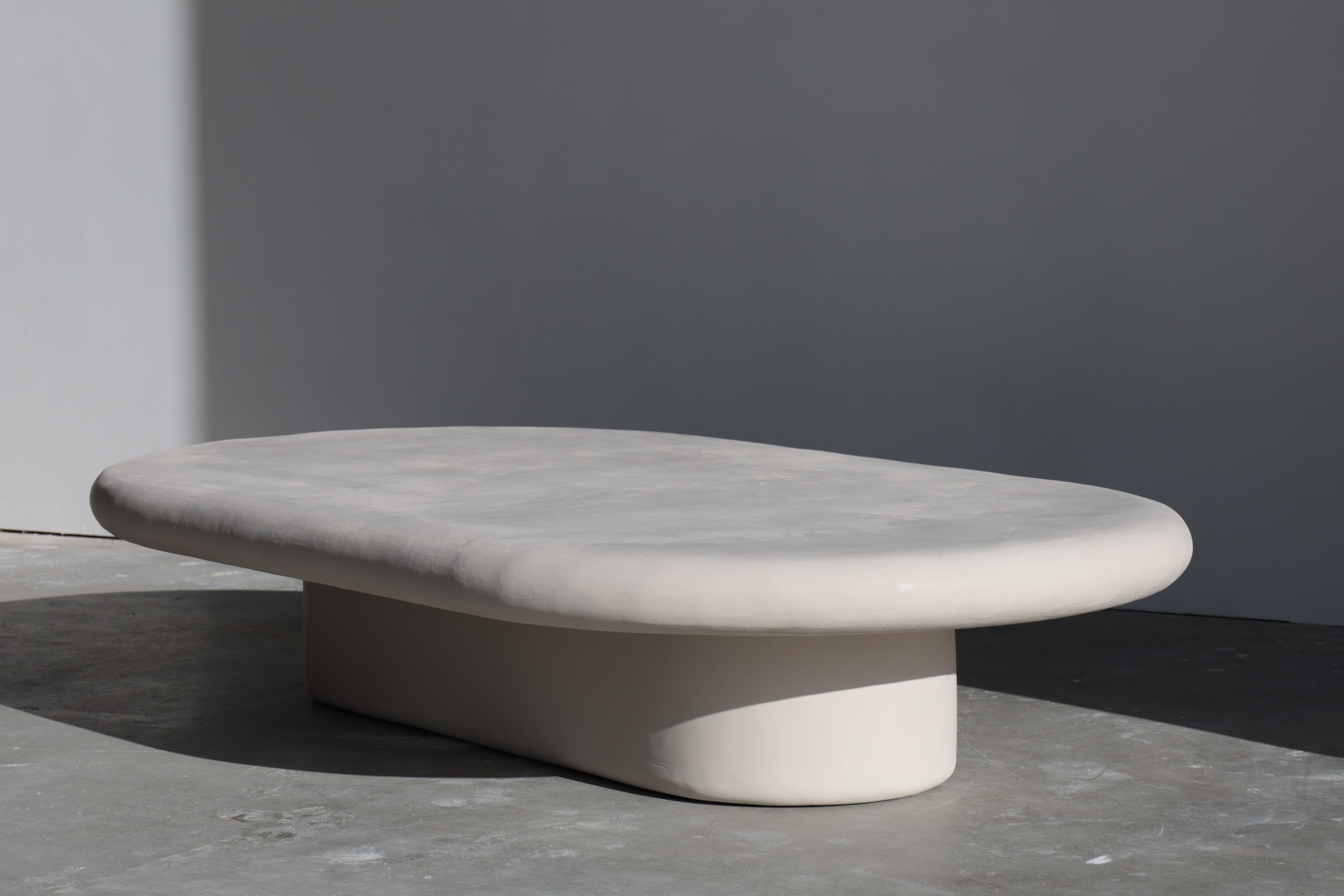 our most popular table, simple and sculptural statement piece. featured in light gobi color.

each öken house studio piece is handmade & made to order by a small team of plaster artisans and we try to utilize local vendors as much as possible. 

we