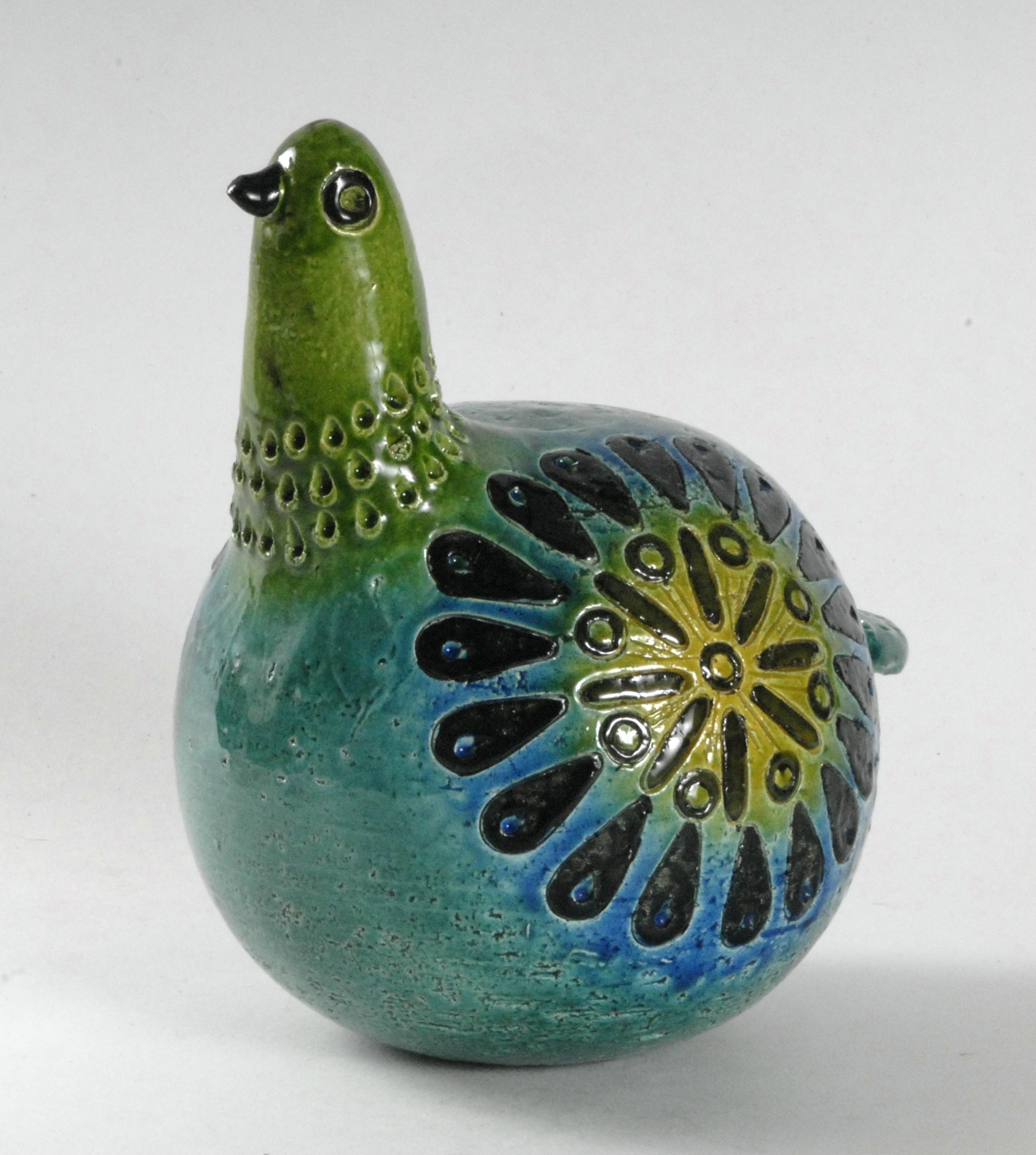 An Aldo Londi designed Gallina, [Hen] highly stylized and whimsical, this example in Kelly Green with yellow glazes. A scarce and collectable piece.