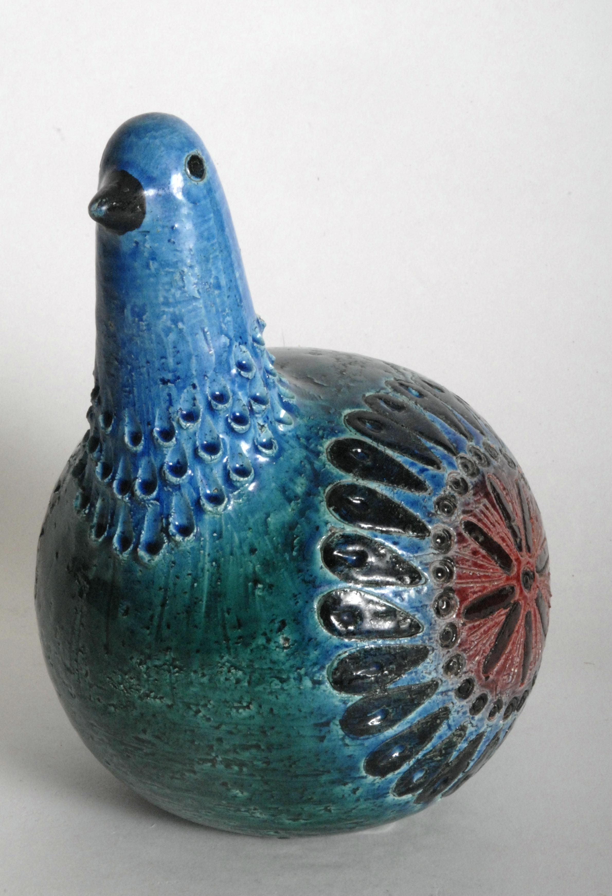 An Aldo Londi designed Gallina, [Hen] highly stylised and whimsical, this example in Kelly Green with red glazes. A scarce and collectable piece.