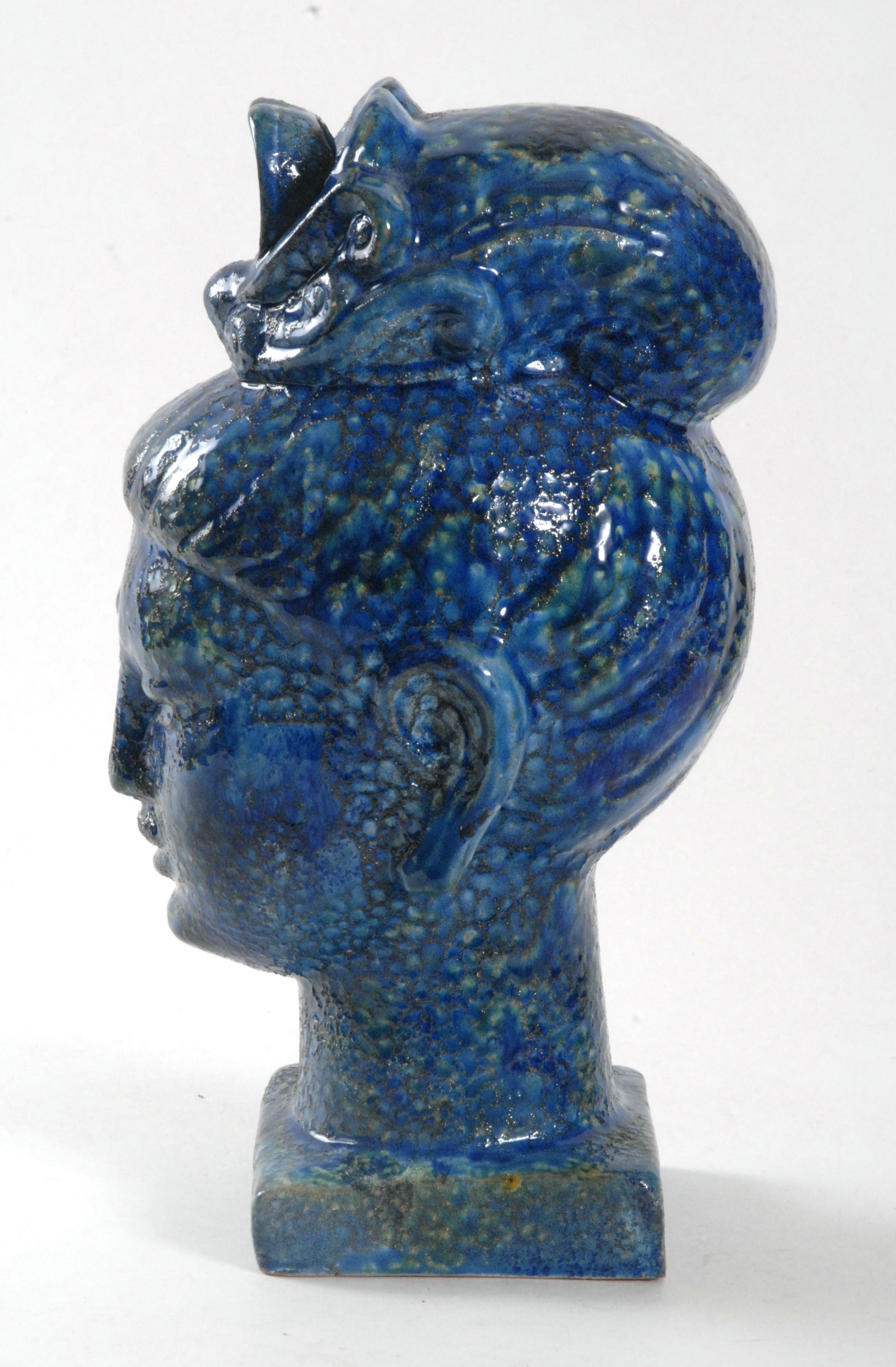 An Aldo Londi designed Guan Yin Head with a blue 'Cinese' [Chinese] glaze, in perfect condition and of a large size, a lovely contemplative piece for the collector or designer.