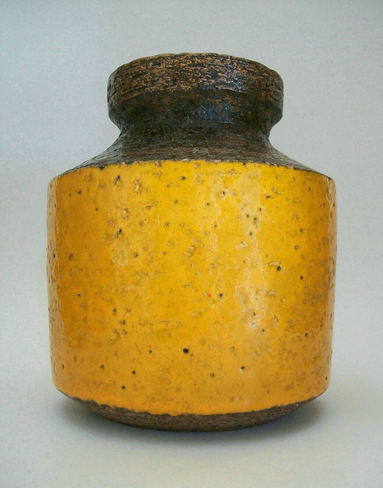 Bitossi (Manufacturer) - Aldo Londi (Designer) - rare mid century studio pottery vase - hand made - featuring a color block palette of mustard and brown glazes with a white glazed interior - textured finish - signed on the base - Italy - circa