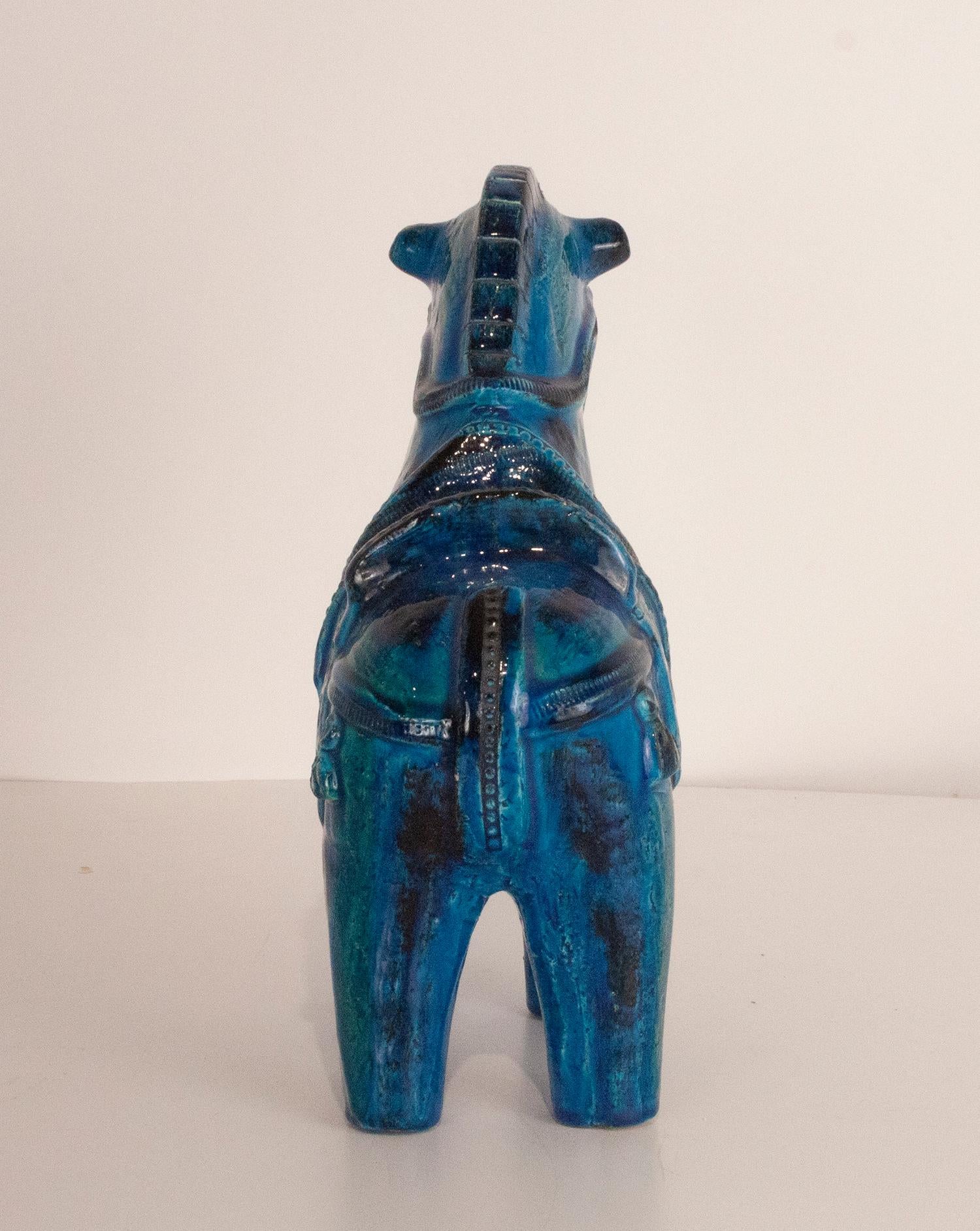 Rimini Blu glazed horse by Aldo Londi for Bitossi.
Large size, in very good condition.
Different shades of blues and greens.
A very decorative piece with a cheerful color.
Master Italian ceramist Aldo Londi created a range of decorative objects in
