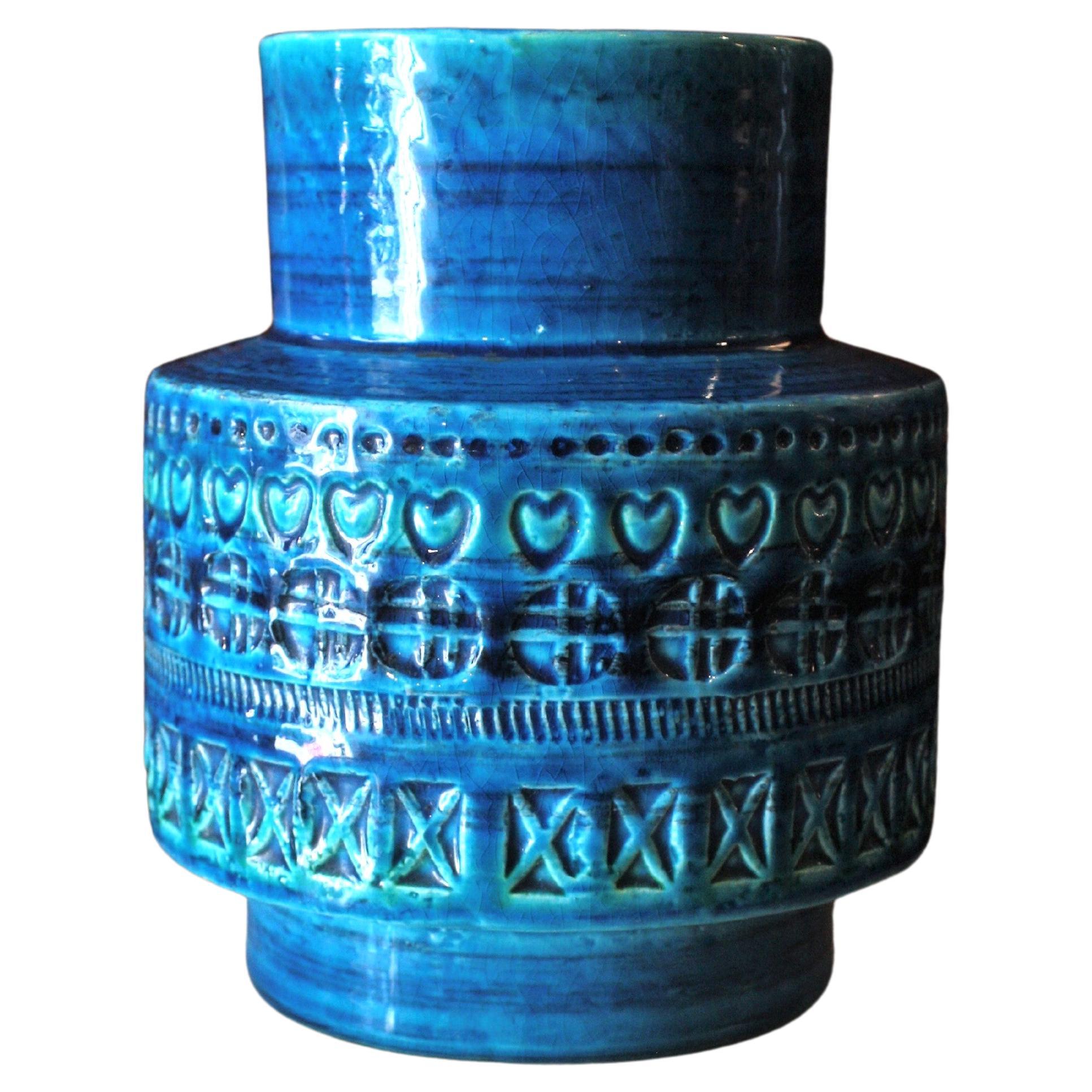 'Rimini blu' glazed ceramic vase designed by Aldo Londi for by Bitossi. Italy, 1960s.
This eye-catching vase is made of blue glazed ceramic with engraved patterns surrounding the central part. Its gorgeous shades of blue and the geometric design of